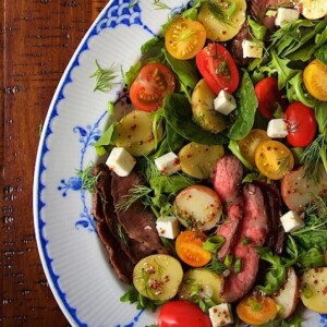 Steak and Potato Arugula Salad - a fresh yet hearty entree with steak, warm potatoes and a delicious champagne vinaigrette, this healthy salad is a meal in a bowl easy enough for every day, elegant enough for a dinner party