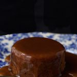 Sticky Toffee Pudding Cake - an iconic British treat that is beyond delicious. The cake is moist and full of flavor. The buttery toffee sauce is super easy to make.