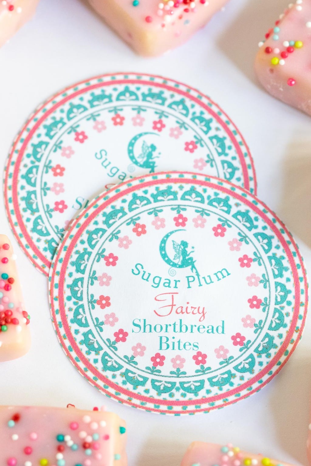 Ultra closeup vertical photo of custom gift labels for Sugar Plum Fairy Shortbread Bites.