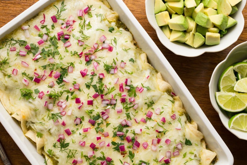 Overhead picture of Super Easy Chicken Enchiladas Verde with toppings