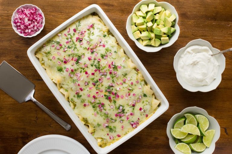 Super Easy Chicken Enchiladas Verde - with a few easy shortcuts, have these delicious enchiladas on your table in less than an hour.