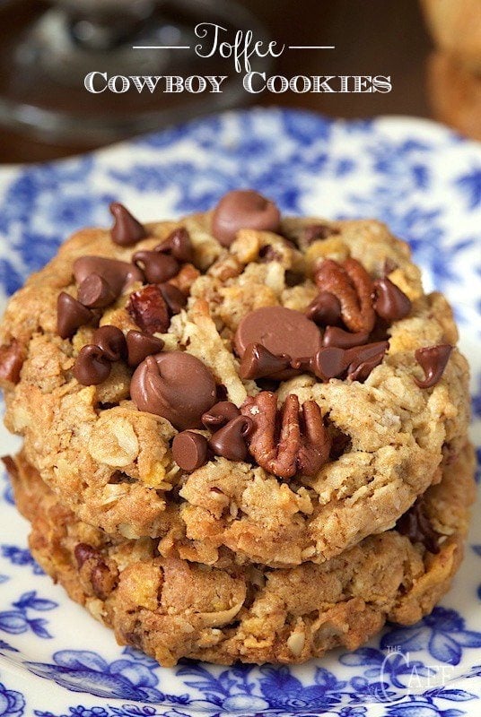 Toffee Cowboy Cookies - an old classic treat with a few fun twists, these delicious cookies are loaded with chocolate chips, sweet toffee bits and crisp toasted pecans. www.thecafesucrefarine.com