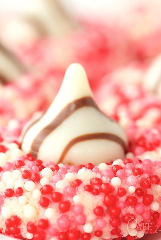 Super closeup photo of an Easy Valentine Shortbread Cookie featuring Hershey's Hugs candy.