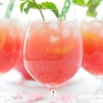 Vertical picture of Watermelon Mint Lemonade in glasses with green straws