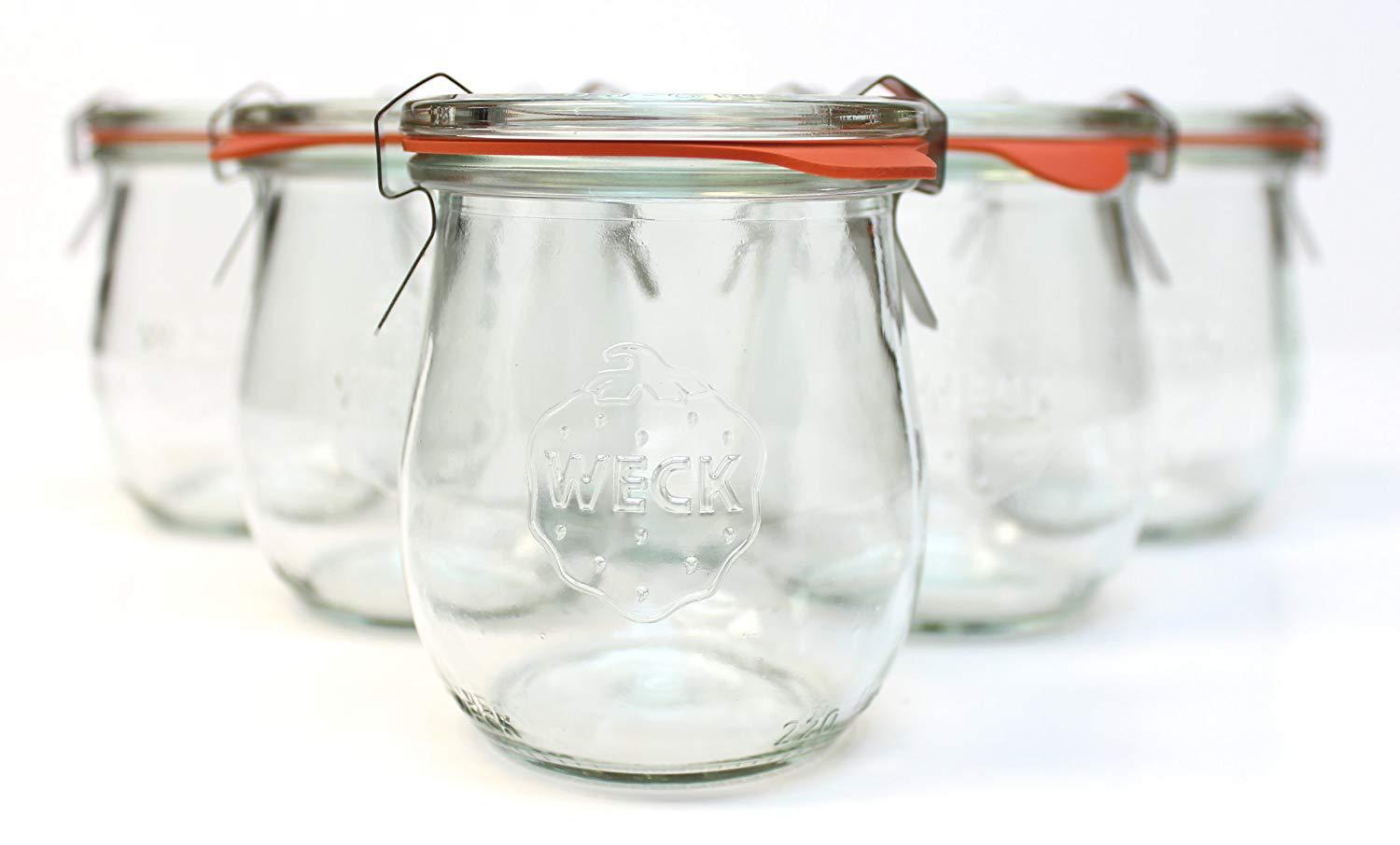 Stock photo of a set of Weck canning/serving jars.