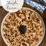 Vertical overhead photo of a Maple Walnut Banana Coffee Cake with a text graphic at the top left of the photo.