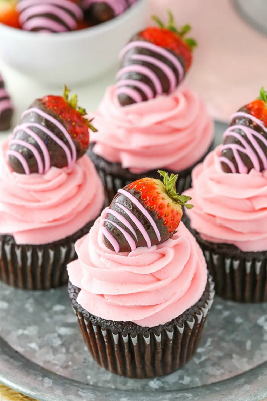 Close up picture of Chocolate Covered Strawberry Cupcakes from the Life, Love and Sugar website.